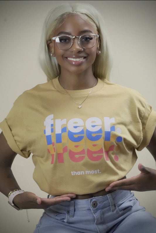 "Freer Than Most" Tee (Tan/Multicolor)